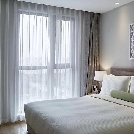 One Sunland Serviced Suites Managed By Lanson Place Шанхай Экстерьер фото